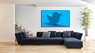 Πίνακας, ένα μπλε λογότυπο twitter σε μπλε φόντο