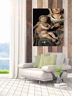 Πίνακας, ένα άγαλμα μιας γυναίκας που κρατά ένα παιδί