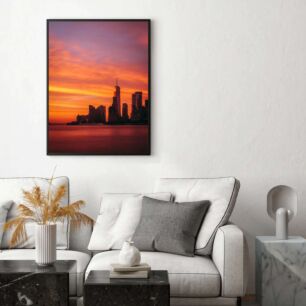 Πίνακας, θέα στο ηλιοβασίλεμα μιας πόλης με ψηλά κτίρια