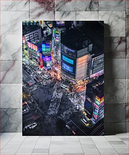 Πίνακας, Aerial View of a Busy City Intersection at Night Εναέρια άποψη μιας πολυσύχναστης διασταύρωσης πόλης τη νύχτα