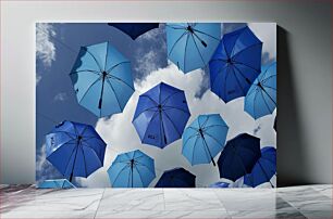 Πίνακας, Blue Umbrellas Against a Cloudy Sky Μπλε ομπρέλες ενάντια σε έναν συννεφιασμένο ουρανό