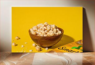 Πίνακας, Bowl of Popcorn on Yellow Background Μπολ με ποπ κορν σε κίτρινο φόντο