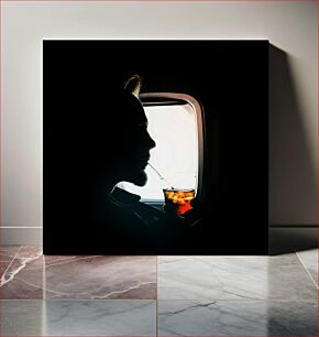 Πίνακας, Silhouette of a Man Drinking on an Airplane Σιλουέτα ενός άνδρα που πίνει σε ένα αεροπλάνο
