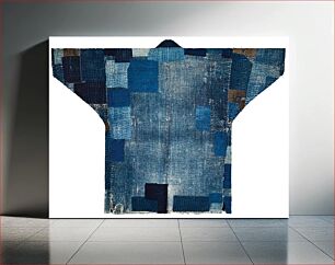 Πίνακας, Thick, cotton patchwork coat with various shades of blue and brown patches; dark blue band of fabric at opening