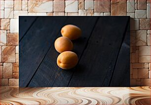 Πίνακας, Three Apricots on Wooden Surface Τρία Βερίκοκα σε Ξύλινη Επιφάνεια