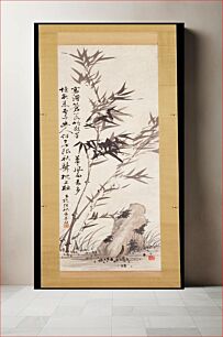 Πίνακας, two long slender stalks of bamboo grow from the left corner; left of bamboo is a lichen-covered rock; two lines of Chinese running script extend down left side